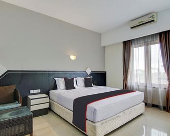 Dancenter Grand Sahara Hotel - Pekanbaru - Schlafzimmer
