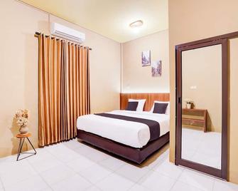 Collection O De Orchids Hotel Near Transmart Padang - Kota Padang - Kamar Tidur