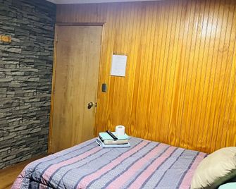 Hostal Santa Fe - Castro - Bedroom