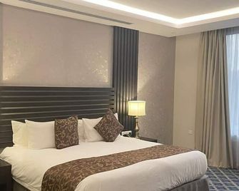 Gold Inn Serviced Apartment - Riad - Habitación