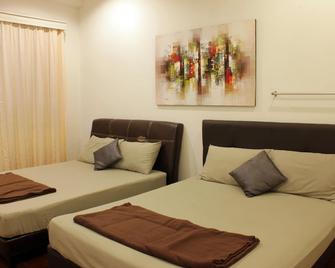 Homey 55 Cottage - Kuching - Chambre