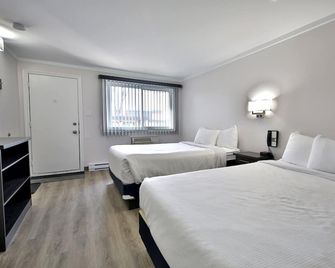 Motel Newstar Laval - Laval - Soverom