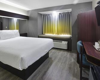 Microtel Inn & Suites by Wyndham Meridian - Meridian - Bedroom