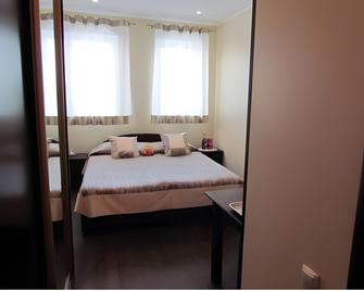 Hotel Nord Point - Moermansk - Slaapkamer