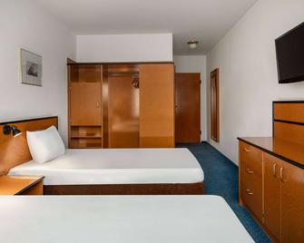 Aspire Frankfurt Airport, Trademark Collection by Wyndham - Rüsselsheim - Bedroom