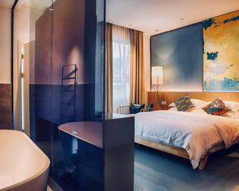 Huizhou Xilin West Lake Boutique Hotel - Huizhou - Schlafzimmer