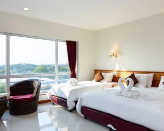 Kanchanaburi City Hotel - קאנצ'אנאבורי - חדר שינה