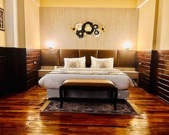 Silver Cloud Hotel - פארו - חדר שינה