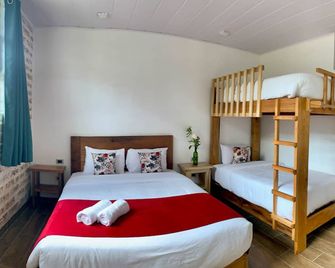Margarit Boutique Hotel - Mindo - Bedroom
