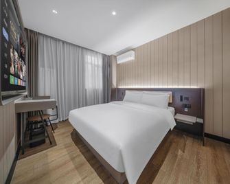 Hanting Hotel Qingdao Licang Jinshui Road - צ'ינגדאו - חדר שינה