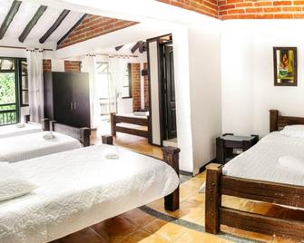 Finca Hotel Casa Nostra - Quimbaya - Schlafzimmer