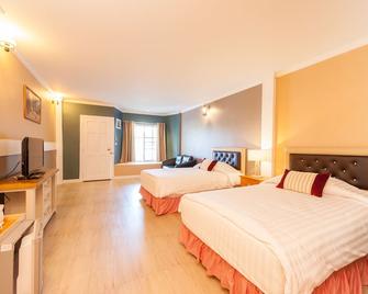 Belmont Village Hotel - Mu Si - Bedroom