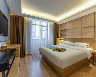 Metropolo Hotel Jiujiang Happy City Jiulong Street - Jiujiang - Bedroom