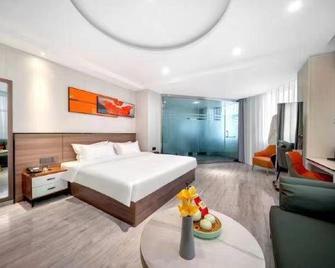 Huayi Select Hotel (Jiamusi Railway Station) - Jiamusi - Quarto