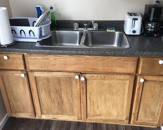 Coach house with outside seating area and Kitchen facilities. No-1 - Chilliwack - Kitchen