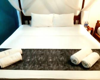 Palitha Home Stay - סיגיריאה - חדר שינה