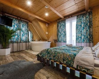Góralska Villa Apartamenty Z Jacuzzi & Home Spa & Zakopane - Poronin - Schlafzimmer