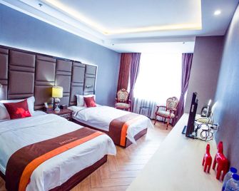 Dandong Yihai Business Hotel - Dandong - Ložnice