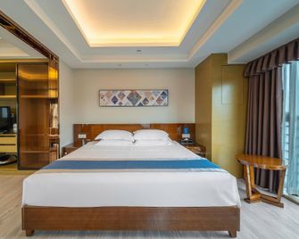 Burui Bay Riverside Apartment Hotel - Zhuhai - Schlafzimmer