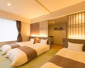 Matsue New Urban Hotel - מאטסו - חדר שינה