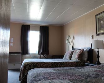 Nomad Motel - Clinton - Спальня