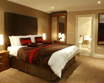 كيلارني أوكس هوتل - كيلارنيي - غرفة نوم