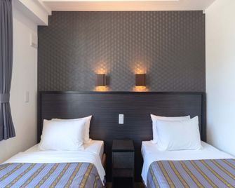 Hotel Koza - Okinawa - Slaapkamer
