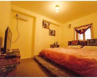 Yi's Hostel - Diqing - Bedroom
