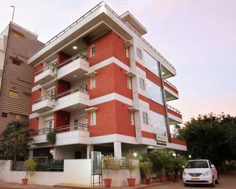 Orange Suites Airport Transit Stay - Bengaluru - Building