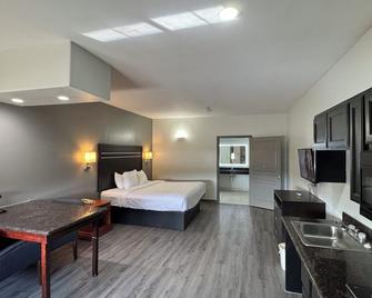 Sunbridge Inn And Suites - Jourdanton - Schlafzimmer