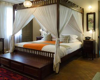 Satri House Hotel - לואנג פראבאנג - חדר שינה