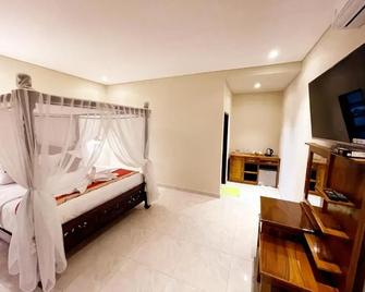Bali 85 Beach Inn - Manggis - Schlafzimmer