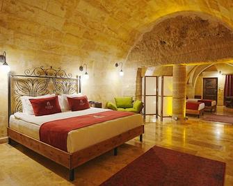 Kayra Cave Suites - גורמה - חדר שינה