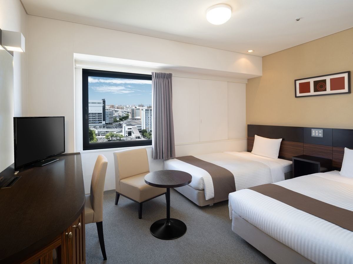Art Hotel Niigata Station - נייגאטה - חדר שינה