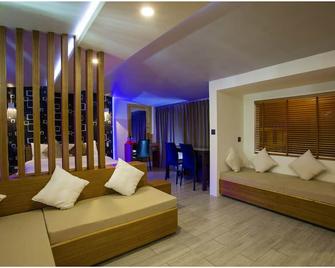 Ripple Beach Inn - Malé - Schlafzimmer