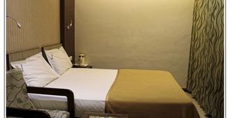 Hotel Prem Nivas - Madurai - Phòng ngủ