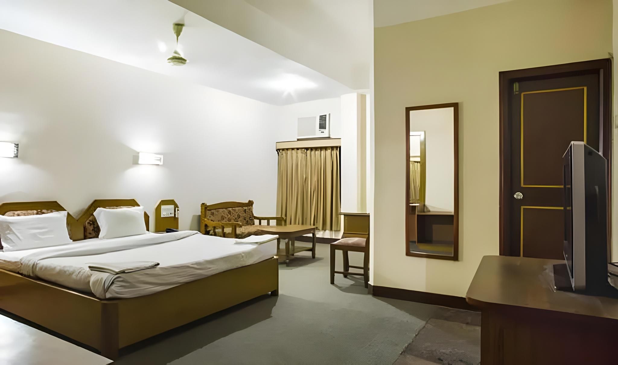 Hotel Hornbill - גוואטי - חדר שינה