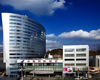 Urumqi Southern Airlines Pearl International Hotel - Ürümqi - Building