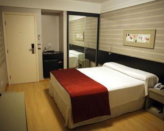 Max Plaza Hotel - Marília - Schlafzimmer