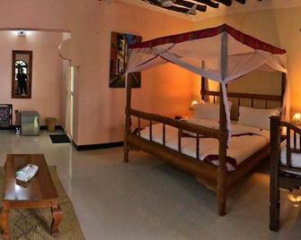Zanpalm Boutique Hotel - Michamvi - Camera da letto
