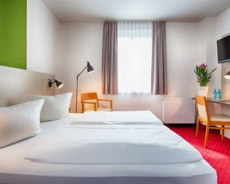 Achat Hotel Chemnitz - קמניץ - חדר שינה