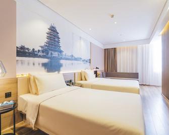 Atour Hotel Guiyang North Railway Station - Guiyang - Schlafzimmer