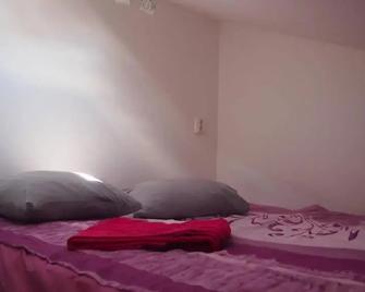 Garden House and Rooms - Lund - Schlafzimmer