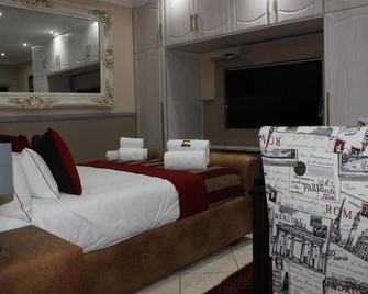 Romans Rest Guest House - Carletonville - Habitación