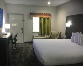 Muskogee Inn And Suites - Muskogee - Bedroom