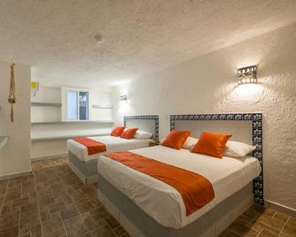 Hotel Caracol - Puerto Morelos - Schlafzimmer
