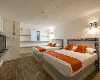 هوتل كاراكول بويرتو موريلوس - بويرتو موريلو - غرفة نوم