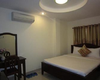 Nui Thanh Hotel - Ciudad Ho Chi Minh - Habitación