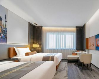Harbin Zhengming Jinjiang Hotel - Harbin - Habitación