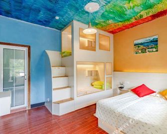 Xidi Kunlun Youth Hostel - הואנגשאן - חדר שינה